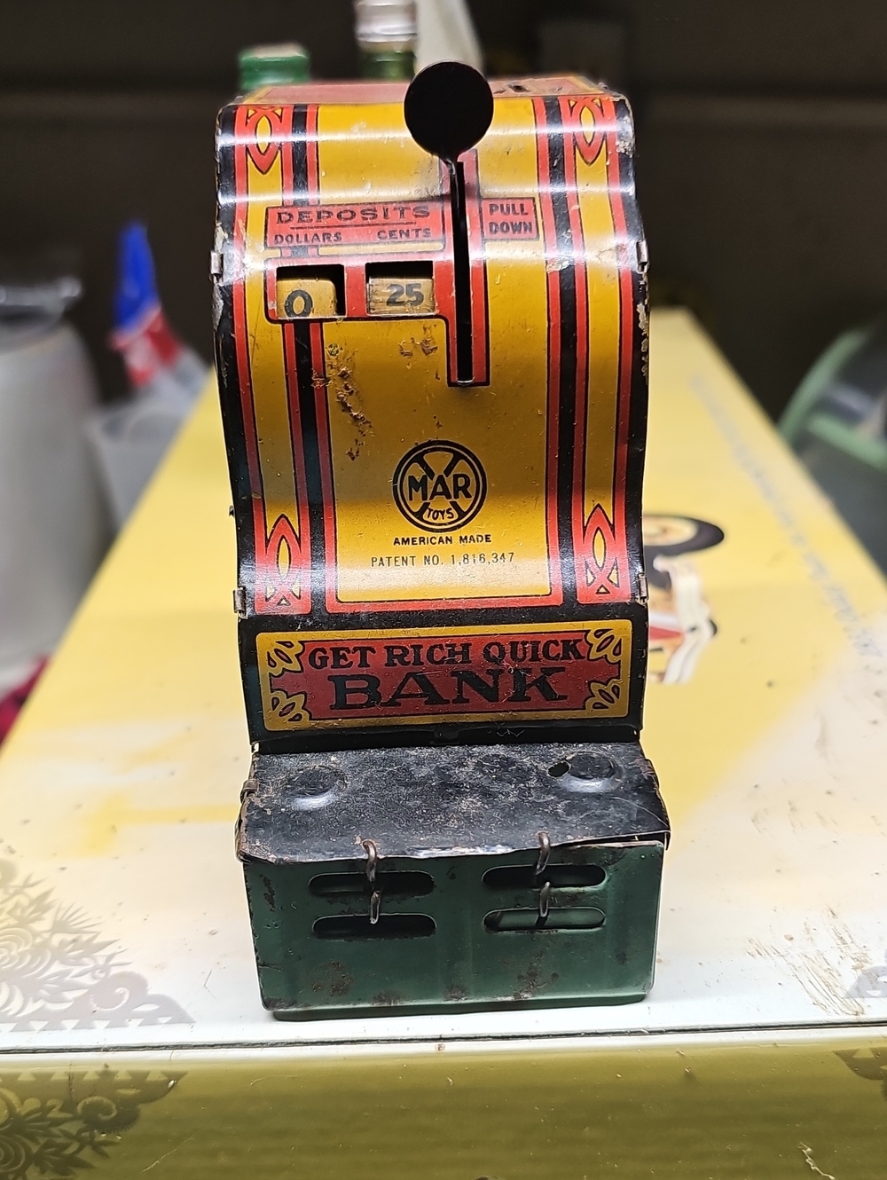 Vintage Louis Marx Toy Co. 'Get Rich Quick' Tin Bank in Yellow and Green Nice